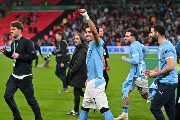 Arsenal v Manchester City, EFL Cup, Cup Final Matheus Nunes (27) of Manchester City celebrates winning the Carabao Cup at full time during the EFL Cup match between Arsenal and Manchester City at Wembley Stadium, London, UK on 22 March 2026. London Wembley Stadium Greater London UK Editorial use only DataCo restrictions apply See www.football-dataco.com , Copyright: xGrahamxHuntx PSI-23937-0327