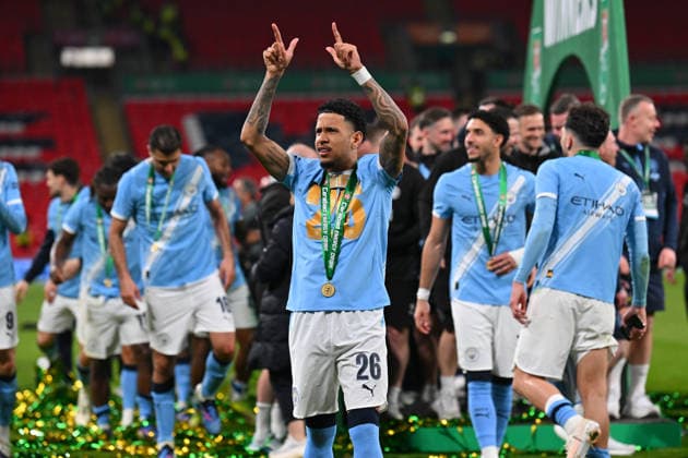 Arsenal v Manchester City, EFL Cup, Cup Final Savio (26) of Manchester City celebrates winning the Carabao Cup during the post match celebrations after the EFL Cup match between Arsenal and Manchester City at Wembley Stadium, London, UK on 22 March 2026. London Wembley Stadium Greater London UK Editorial use only DataCo restrictions apply See www.football-dataco.com , Copyright: xGrahamxHuntx PSI-23937-0337