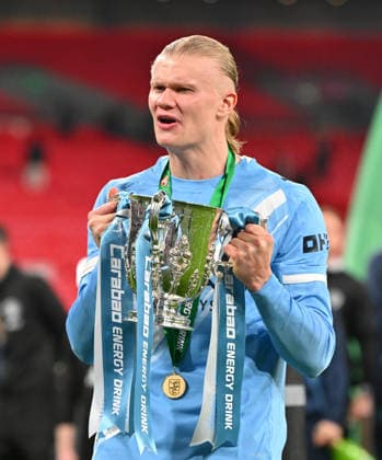 Arsenal v Manchester City, EFL Cup, Cup Final Erling Haaland (9) of Manchester City poses with the trophy as he celebrates winning the Carabao Cup during the post match celebrations after the EFL Cup match between Arsenal and Manchester City at Wembley Stadium, London, UK on 22 March 2026. London Wembley Stadium Greater London UK Editorial use only DataCo restrictions apply See www.football-dataco.com , Copyright: xGrahamxHuntx PSI-23937-0338