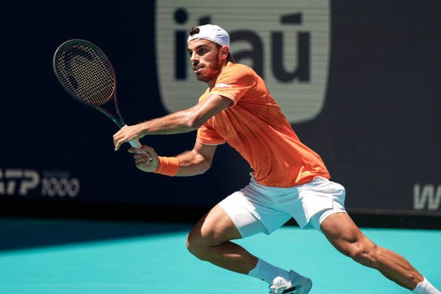 March 23, 2026, Miami Gardens, Florida, USA: Francisco Cerundolo (ARG) hits a forehand shot to Daniil Medvedev (not pictured) during the men s third round singles match at the 2026 Miami Open presented by Itau at Hard Rock Stadium. TENNIS 2026: Miami Open.  - ZUMAw109 20260323_fap_w109_008 Copyright: xDebbyxWongx