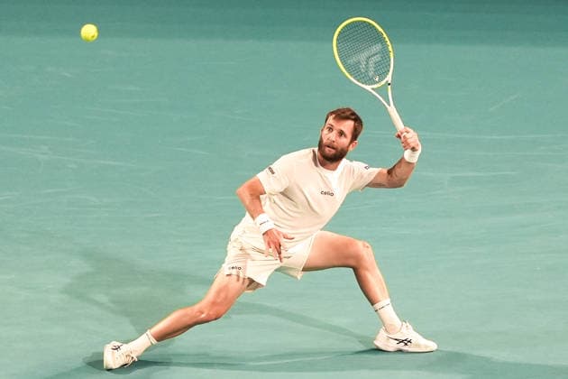 March 23, 2026, Miami Gardens, Florida, USA: Corentin Moutet (FRA) returns a shot to Jannick Sinner (not pictured) during the men s third round singles match at the 2026 Miami Open presented by Itau at Hard Rock Stadium. Miami Gardens USA - ZUMAw109 20260323_fap_w109_057 Copyright: xDebbyxWongx