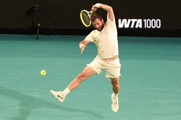 March 23, 2026, Miami Gardens, Florida, USA: Corentin Moutet (FRA) returns a shot to Jannick Sinner (not pictured) during the men s third round singles match at the 2026 Miami Open presented by Itau at Hard Rock Stadium. TENNIS 2026: Miami Open.  - ZUMAw109 20260323_fap_w109_052 Copyright: xDebbyxWongx