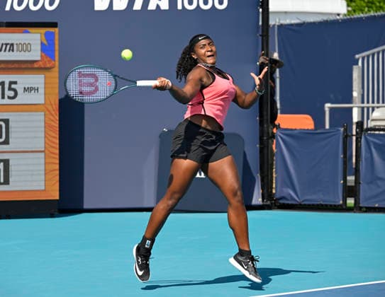 MIAMI GARDENS, FL - MARCH 23: Hailey Baptiste of the United States returns a shot to Jelena Ostapenko of Latvia on Day 7 of the Miami Open Presented by Itau at Hard Rock Stadium on March 23, 2026 in Miami Gardens, Florida. (Photo by Michele Eve Sandberg Icon Sportswire) TENNIS: MAR 23 Miami Open EDITORIAL USE ONLY Icon26032321