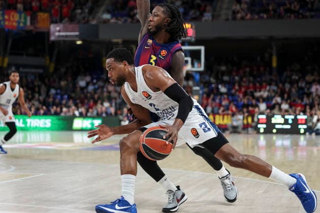 March 24, 2026, Barcelona, Barcelona, Spain: Jordan Loyd of Anadolu Efes Istanbul and Myles Cale of FC Barcelona, Barca in action during the EuroLeague Regular Season Round 33 match played between FC Barcelona and Anadolu Efes Istanbul at Palau Blaugrana on March 24, 2026 in Barcelona, Spain. Barcelona Spain - ZUMAa181 20260324_zaa_a181_121 Copyright: xJavierxBorregox