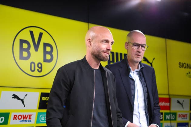 Dortmund, Deutschland: 25. März 2026 - Pressekonferenz - Vorstellung des neuen BVB Sportdirektors Nils-Ole Book Im Bild: v.li. der neue BVB Sportdirektor Nils-Ole Book (BVB) und Geschäftsführer Carsten Cramer (BVB) bei der Pressekonferenz DFB regulations prohibit any use of photographs as image sequences and or quasi-photo