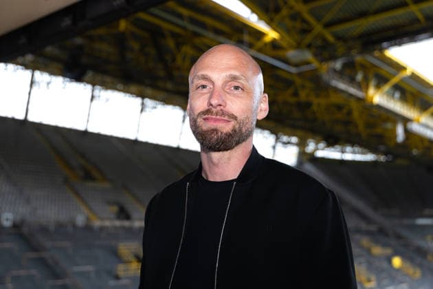 25.03.2026, Fussball, Pressekonferenz, Vorstellung des neuen Sportdirektors Ole Book (Borussia Dortmund). Sportdirektor Ole Book (Borussia Dortmund) steht im Stadion. Dortmund Signal Iduna Park NRW Deutschland xRHR-FOTO DEx
