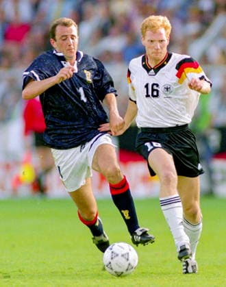 920615 Football, UEFA EURO, EM, Europameisterschaft,Fussball 1992, Group 2, Germany - Scotland 2-0: Scotlands Gary McAllister against Germanys Matthias Sammer. Photo: BILDBYRAN M026_07 M026_07 germany scotland 920615 scanx fotboll em em92 em 92 em 1992 em1992 group 2 bbeng dia football soccer sverige sweden germany v scotland euro uefa euro 1992 euro1992 euro92 european championships europamästerskap idrottsparken stadium norrkoping june 15 1992 *** 920615 Football, Uefa EURO 1992, Group 2, Germany Scotland 2 0 Scotlands Gary McAllister against Germanys Matthias Sammer Photo BILDBYRAN M026 07 M026 07 germany scotland 920615 scanx fotboll em em92 em 92 em 1992 em1992 group 2 bbeng dia football soccer sverige sweden germany v scotland euro uefa euro 1992 euro1992 euro92 european championships europamästerskap idrottsparken stadium norrkoping june 15 1992  Copyright: BILDBYRAN BB920615BB113
