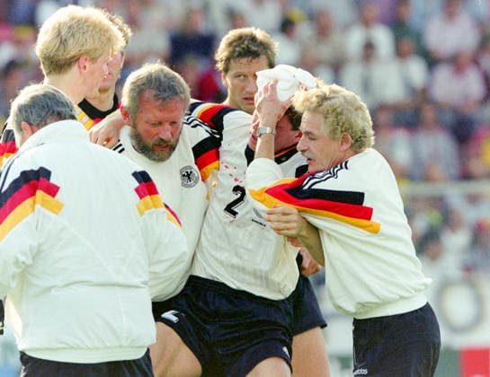 920615 Football, UEFA EURO, EM, Europameisterschaft,Fussball 1992, Group 2, Germany - Scotland 2-0: Germanys Stefan Reuter is carried off the pitch after a head injury. Photo: BILDBYRAN M026_07 M026_07 germany scotland 920615 scanx fotboll em em92 em 92 em 1992 em1992 group 2 bbeng dia football soccer sverige sweden germany v scotland euro uefa euro 1992 euro1992 euro92 european championships europamästerskap idrottsparken stadium norrkoping june 15 1992 *** 920615 Football, Uefa EURO 1992, Group 2, Germany Scotland 2 0 Germanys Stefan Reuter is carried off the pitch after a head injury Photo BILDBYRAN M026 07 M026 07 germany scotland 920615 scanx fotboll em em92 em 92 em 1992 em1992 group 2 bbeng dia football soccer sverige sweden germany v scotland euro uefa euro 1992 euro1992 euro92 european championships europamästerskap idrottsparken stadium norrkoping june 15 1992  Copyright: BILDBYRAN BB920615BB121