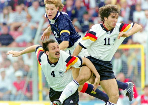 920615 Football, UEFA EURO, EM, Europameisterschaft,Fussball 1992, Group 2, Germany - Scotland 2-0: Germanys Jurgen Kohler (L) and Karl-Heinz Riedle against Scotlands Richard Gough in an aerial duel. Photo: BILDBYRAN M026_07 M026_07 germany scotland 920615 scanx fotboll em em92 em 92 em 1992 em1992 group 2 bbeng dia football soccer sverige sweden germany v scotland euro uefa euro 1992 euro1992 euro92 european championships europamästerskap idrottsparken stadium norrkoping june 15 1992 *** 920615 Football, Uefa EURO 1992, Group 2, Germany Scotland 2 0 Germanys Jurgen Kohler L and Karl Heinz Riedle against Scotlands Richard Gough in an aerial duel Photo BILDBYRAN M026 07 M026 07 germany scotland 920615 scanx fotboll em em92 em 92 em 1992 em1992 group 2 bbeng dia football soccer sverige sweden germany v scotland euro uefa euro 1992 euro1992 euro92 european championships europamästerskap idrottsparken stadium norrkoping june 15 1992  Copyright: BILDBYRAN BB920615BB156