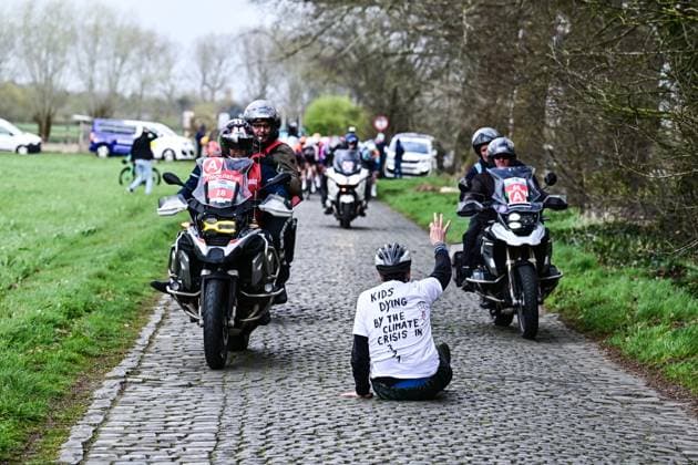 Sport Bilder des Tages a protestor on the road during the Ronde van Brugge men s elite one-day cycling race, 202,9 km from and to Brugge on Wednesday 25 March 2026. MAARTENxSTRAETEMANS  x168873167x