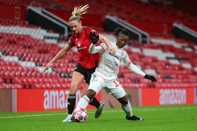 Manchester United, ManU Women v Bayern Munich Women Fridolina Rolfö of Manchester United battles with Bernadette Amani of Bayern Munich during Manchester United Women v Bayern Munich Women UEFA Champions League Quarter-Final 1st Leg match at Old Trafford, Manchester, England on 25 March 2026 Credit: Luke Williams Every Second Media Editorial use only. All images are copyright Every Second Media Limited. No images may be reproduced without prior permission. Copyright: xIMAGO EveryxSecondxMediax ESM-1877-0026 LukexWilliamsx xEveryxSecondxMediax
