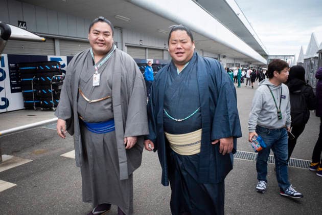 March 26, 2026, Suzuka, Mie, Japan: Sumo wrestlers visiting the paddock on media day for the 2026 Formula 1 Japanese Grand Prix. Formula 1 is one of the most logistically complicated sporting events in the world and the price of motorsport logistics has been affected by the US-Iran warÃ¢â‚¬â ¢s impact on air freight shipping lanes and oil prices. Suzuka Japan - ZUMAb177 20260326_aap_b177_031 Copyright: xTaidghxBarronx