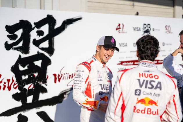 Formula 1 Aramco Japanese Grand Prix 2026 - Media Day LIAM LAWSON (NZL) of Visa Cash App Racing Bulls Formula One Team 30 and ARVID LINDBLAD (GBR) of Visa Cash App Racing Bulls Formula One Team 41 posing next to a painting done at the track by local artist on Media Day during the 2026 Formula 1 Aramco Japanese Grand Prix at the Suzuka Circuit on March 26, 2026. Photo by Antoine Lapeyre ABACAPRESS.COM Suzuka Japan  Copyright: xLapeyrexAntoine ABACAx