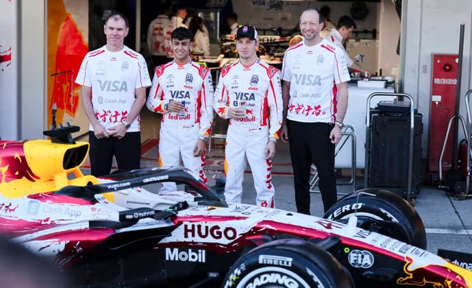 March 26, 2026, Suzuka, Mie, Japan: ARVID LINDBLAD, LIAM LAWSON and Racing Bulls Team Principal LAURENT MEKIES pose in Japan special edition race suits alongside the teamÃ¢â‚¬â ¢s Japanese Grand Prix special livery car during media day ahead of the Formula 1 Japanese Grand Prix at Suzuka Circuit. Suzuka Japan - ZUMAh201 20260326_zsp_h201_026 Copyright: xYichinxHoux