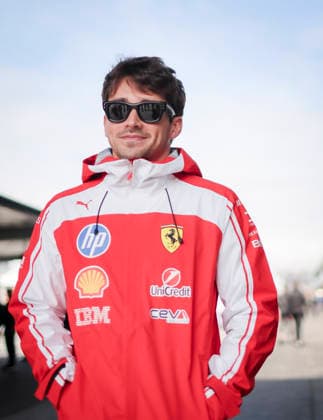 March 26, 2026, Suzuka, Mie, Japan: CHARLES LECLERC of Ferrari heads toward the garage after speaking with a staff member in the paddock ahead of the Formula 1 Japanese Grand Prix at Suzuka Circuit. Suzuka Japan - ZUMAh201 20260326_zsp_h201_034 Copyright: xYichinxHoux