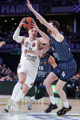 March 26, 2026, Madrid, Madrid, Spain: Mario Hezonja of Real Madrid and Ercan Osmani of Anadolu Efes Istanbul in action during the Turkish Airlines EuroLeague Regular Season Round 34 match between Real Madrid and Anadolu Efes Istambul at Movistar Arena, on March 26, 2026, in Madrid, Spain. Madrid Spain - ZUMAa181 20260326_zaa_a181_090 Copyright: xIrinaxR.xHipolitox