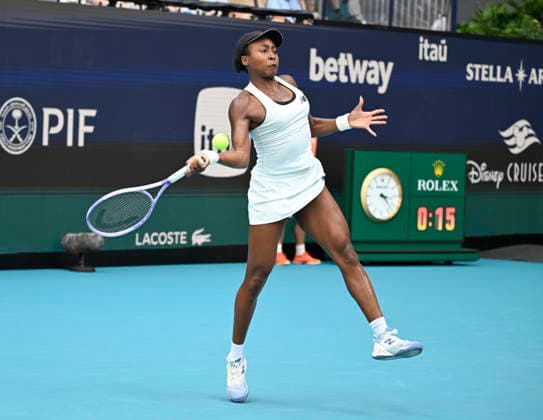 MIAMI GARDENS, FL - MARCH 26: Coco Gauff of the United States returns a shot to Karolina Muchova of Czech Republic during the men™s semifinal match of the Miami Open on March 26, 2026, Hard Rock Stadium in Miami Gardens, Florida. (Photo by Michele Eve Sandberg Icon Sportswire) TENNIS: MAR 26 Miami Open EDITORIAL USE ONLY Icon2603260531