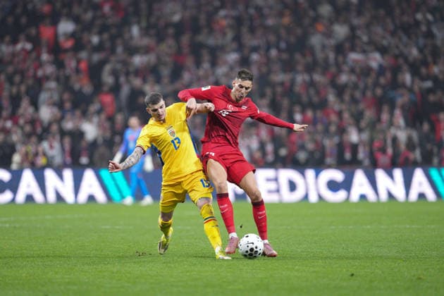 ISTANBUL, TURKIYE - MARCH 26: Valentin Mihaila of Romania and Mert Muldur of Turkiye in action during the 2026 World Cup Qualifying - UEFA, Playoff Semifinals match between Turkiye and Romania at Besiktas Park on March 26, 2026 in Istanbul, Turkiye.  Copyright: xAlexandraxFechetex xSPPx Sportspressphoto_SPR118979