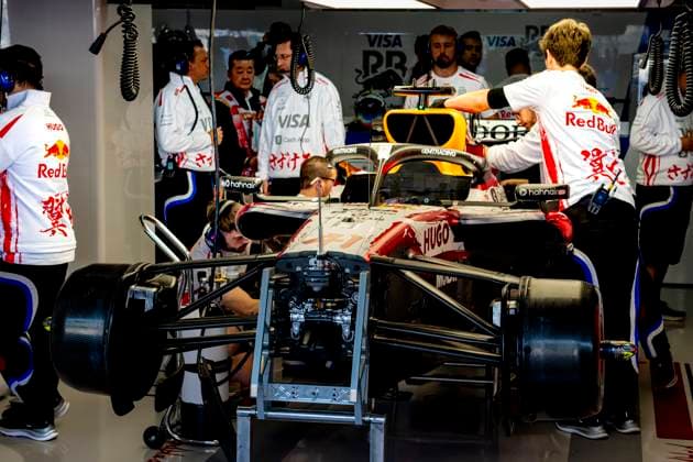 SUZUKA - Mechanics at work on the car of Formula 1 driver Arvid Lindblad or Visa Cash App Racing Bulls Formula One Team during the Formula 1 Japan Suzuka free practice at the Suzuka Formula 1 circuit on March 27, 2025 in Suzuka, Japan. (Photo by DeFodi Images) -