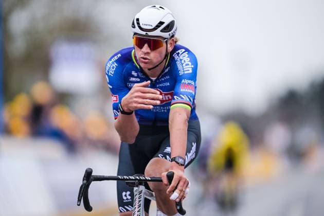 Dutch Mathieu van der Poel of Alpecin-Premier Tech celebrates as he crosses the finish line to win the E3 Saxo Bank Classic one day cycling race, 208,8km from and to Harelbeke, on Friday 27 March 2026. DAVIDxPINTENS  x169096783x