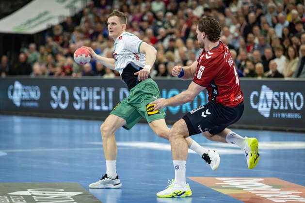 DAIKIN HBL: SG Flensburg-Handewitt vs GWD Minden; 27.03.26 Karolis Antanavicius (Nr.08, GWD Minden) gegen Johannes Golla (Nr.04, SG Flensburg-Handewitt) DAIKIN HBL: SG Flensburg-Handewitt vs GWD Minden, GP JOULE Arena am 27.03.26 Copyright: xBEAUTIFULxSPORTS MarioxM.xKobergx