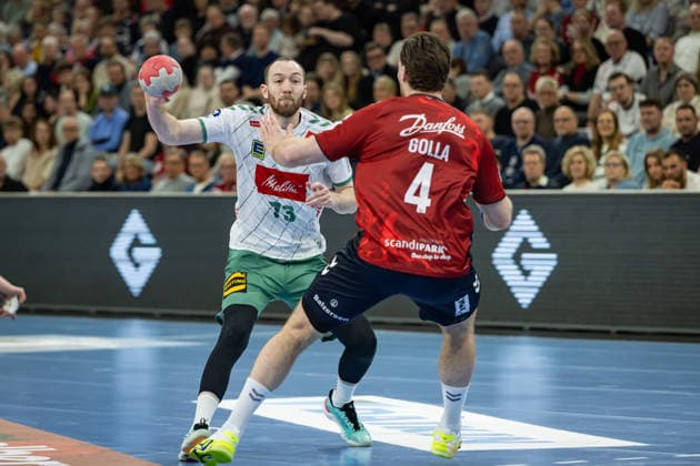 DAIKIN HBL: SG Flensburg-Handewitt vs GWD Minden; 27.03.26 Alexander Weck (Nr.73, GWD Minden) gegen Johannes Golla (Nr.04, SG Flensburg-Handewitt) DAIKIN HBL: SG Flensburg-Handewitt vs GWD Minden, GP JOULE Arena am 27.03.26 Copyright: xBEAUTIFULxSPORTS MarioxM.xKobergx