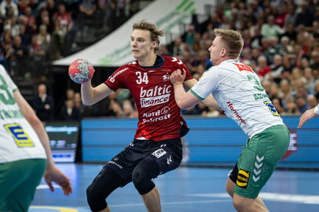 DAIKIN HBL: SG Flensburg-Handewitt vs GWD Minden; 27.03.26 Thilo Knutzen (Nr.34, SG Flensburg-Handewitt) gegen Daniel Astrup Pedersen (Nr.03, GWD Minden) DAIKIN HBL: SG Flensburg-Handewitt vs GWD Minden, GP JOULE Arena am 27.03.26 Copyright: xBEAUTIFULxSPORTS MarioxM.xKobergx