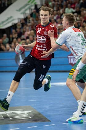 DAIKIN HBL: SG Flensburg-Handewitt vs GWD Minden; 27.03.26 Thilo Knutzen (Nr.34, SG Flensburg-Handewitt) gegen Daniel Astrup Pedersen (Nr.03, GWD Minden) DAIKIN HBL: SG Flensburg-Handewitt vs GWD Minden, GP JOULE Arena am 27.03.26 Copyright: xBEAUTIFULxSPORTS MarioxM.xKobergx