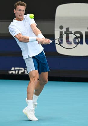 MIAMI GARDENS, FL - MARCH 27: Jiri Lehecka of Czechia returns a shot to Arthur Fils of France during the men™s semifinal match of the Miami Open on March 27, 2026. at Hard Rock Stadium in Miami Gardens, Florida. (Photo by Michele Eve Sandberg Icon Sportswire) TENNIS: MAR 27 Miami Open EDITORIAL USE ONLY Icon2603270658