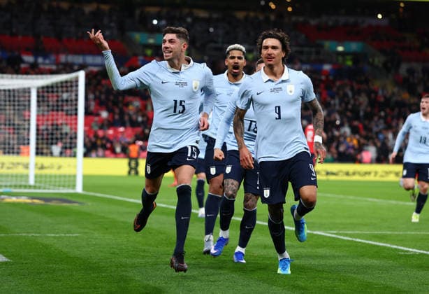 London, England, 27th March 2026. Federico Valverde (L) of Uruguay celebrates with Darwin Nunez (R) of Uruguay after scoring to make it 1-1 during the England vs Uruguay International Friendly, Länderspiel, Nationalmannschaft match at Wembley Stadium, London. Picture credit should read: Paul Terry Sportimage EDITORIAL USE ONLY. No use with unauthorised audio, video, data, fixture lists, club league logos or live services. Online in-match use limited to 120 images, no video emulation. No use in betting, games or single club league player publications. SPI_034_PT_England_Uruguay SPI-4639-0034