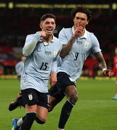 Federico Valverde of Uruguay celebrates with Darwin Nunez after he scores an equalising goal from the penalty spot in injury time to make it 1-1 England v Uruguay. Football. Wembley Stadium, London, UK. 27 MAR 2026Wembley Wembley Stadium LONDON United Kingdom  Copyright: xJASONPIX Shutterstockx 16805560ca