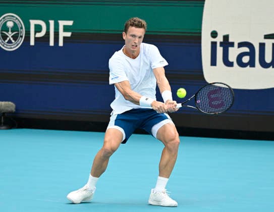 March 27, 2026, Miami Gardens, Fl, United States: Jiri Lehecka of Czechia returns a shot to Arthur Fils of France during the MenÃ¢â‚¬â ¢s Semifinal match of the Miami Open Presented by Itau at Hard Rock Stadium on March 27, 2026 in Miami Gardens, Florida. Florida. 2026 Miami Open, Miami Gardens, USA - 27 Mar 2026  - ZUMAsd3_ 20260327_znp_sd3_003 Copyright: xMichelexEvexSandbergx