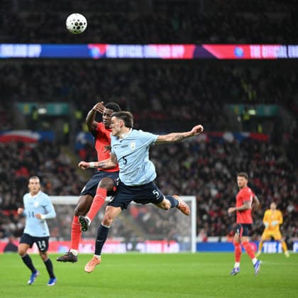 Manuel Ugarte of Uruguay and Kobbie Mainoo of England challenge for the high ball during the International Friendly, Länderspiel, Nationalmannschaft match between England and Uruguay at Wembley Stadium, London, England on 27 March 2026. Copyright: xPhilxHutchinsonx 44760028