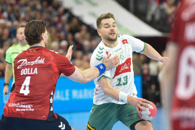 Handball I Herren I Saison 2025-2026 I Bundesliga I 26. Spieltag I SG Flensburg-Handewitt - GWD Minden I 27.03.2026 von links Johannes Golla (4, SG Flensburg-Handewitt), Ian Weber (13, GWD Minden) Copyright: xLobeca JanxKirschnerx