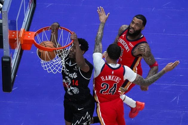 New Orleans Pelicans vs Toronto Raptors TORONTO, CANADA - MARCH 27 : Ja Kobe Walter (14) of Toronto Raptors dunks the ball during the NBA, Basketball Herren, USA basketball game between New Orleans Pelicans and Toronto Raptors at the Scotiabank Arena on March 27, 2026 in Toronto, Ontario, Canada. Mert Alper Dervis Anadolu Ontario Canada. Editorial use only. Please get in touch for any other usage.  Copyright: x2026xAnadoluxMertxAlperxDervisx
