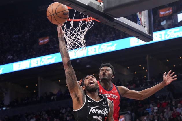 March 27, 2026, Toronto, On, CAN: Toronto Raptors Brandon Ingram, front, plays the ball as New Orleans Pelicans Yves Missi defends during first half NBA, Basketball Herren, USA basketball action in Toronto on Friday March 27, 2026. Canada News - March 27, 2026 - ZUMAc35_ 20260327_zaf_c35_182 Copyright: xChrisxYoungx