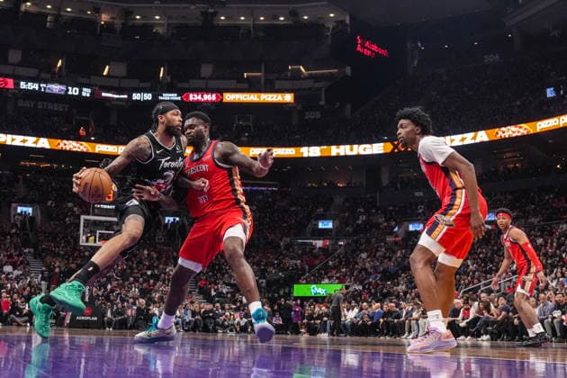 March 27, 2026, Toronto, On, CAN: Toronto Raptors Brandon Ingram (3) drives at New Orleans Pelicans Yves Missi (21) during first half NBA, Basketball Herren, USA basketball action in Toronto on Friday, March 27, 2026. Brandon Ingram; Yves Missi  - ZUMAc35_ 20260327_zaf_c35_184 Copyright: xChrisxYoungx