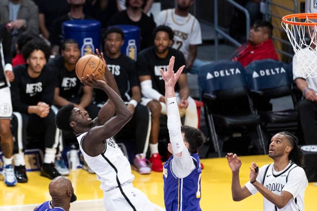 March 27, 2026, Los Angeles, California, USA: Brooklyn NetsÃ¢â‚¬â ¢ Drake Powell (4) shoots against Los Angeles LakersÃ¢â‚¬â ¢ Jake LaRavia (12) during an NBA, Basketball Herren, USA basketball game at Crypto.com Arena on Friday, March 27, 2026 in Los Angeles. NBA 2026: Nets Vs Lakers  - ZUMAc68_ 20260327_zaf_c68_012 Copyright: xRingoxChiux