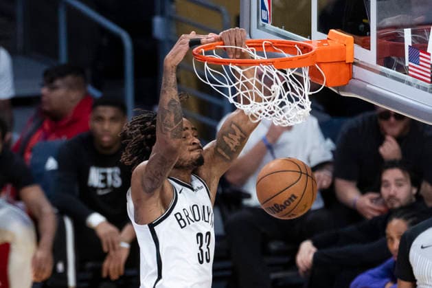 March 27, 2026, Los Angeles, California, USA: Brooklyn NetsÃ¢â‚¬â ¢ Nic Claxton (33) dunks against the Los Angeles Lakers during an NBA, Basketball Herren, USA basketball game at Crypto.com Arena on Friday, March 27, 2026 in Los Angeles. NBA 2026: Nets Vs Lakers  - ZUMAc68_ 20260327_zaf_c68_034 Copyright: xRingoxChiux