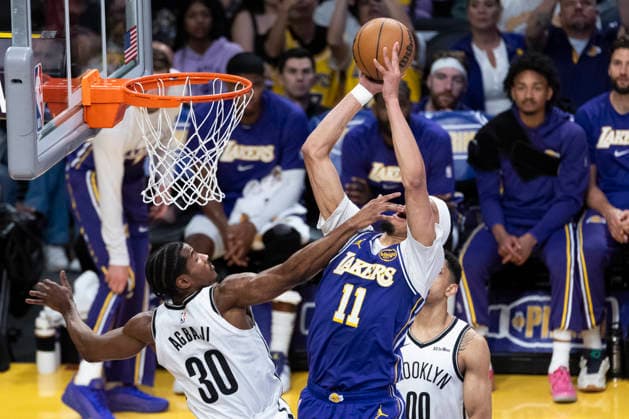 March 27, 2026, Los Angeles, California, USA: Los Angeles LakersÃ¢â‚¬â ¢ Jaxson Hayes (11) goes to the basket under pressure from Brooklyn NetsÃ¢â‚¬â ¢ Ochai Agbaji (30) during an NBA, Basketball Herren, USA basketball game at Crypto.com Arena on Friday, March 27, 2026 in Los Angeles. NBA 2026: Nets Vs Lakers  - ZUMAc68_ 20260327_zaf_c68_038 Copyright: xRingoxChiux