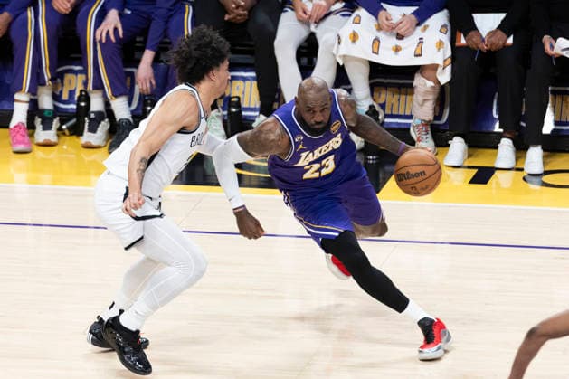 March 27, 2026, Los Angeles, California, USA: Los Angeles LakersÃ¢â‚¬â ¢ LeBron James (23) drives against Brooklyn NetsÃ¢â‚¬â ¢ Nolan Traore (88) during an NBA, Basketball Herren, USA basketball game at Crypto.com Arena on Friday, March 27, 2026 in Los Angeles. NBA 2026: Nets Vs Lakers  - ZUMAc68_ 20260327_zaf_c68_040 Copyright: xRingoxChiux