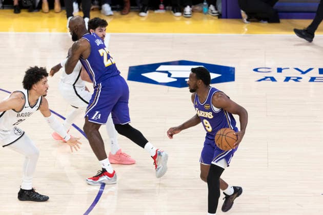 March 27, 2026, Los Angeles, California, USA: Los Angeles LakersÃ¢â‚¬â ¢ Bronny James (9) is defended by Brooklyn NetsÃ¢â‚¬â ¢ Jalen Wilson (22) xxxx during an NBA, Basketball Herren, USA basketball game at Crypto.com Arena on Friday, March 27, 2026 in Los Angeles. NBA 2026: Nets Vs Lakers  - ZUMAc68_ 20260327_zaf_c68_042 Copyright: xRingoxChiux