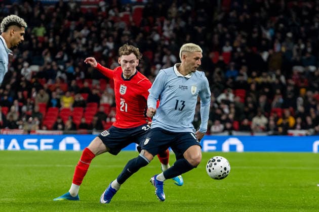England v Uruguay, Friendly Uruguay defender Guillermo Varela battles for possession with England midfielder James Garner during the Friendly match between England and Uruguay at Wembley Stadium, London, UK on 27 March 2026. London Wembley Stadium Greater London UK Editorial use only , Copyright: xManjitxNarotrax PSI-23956-0093