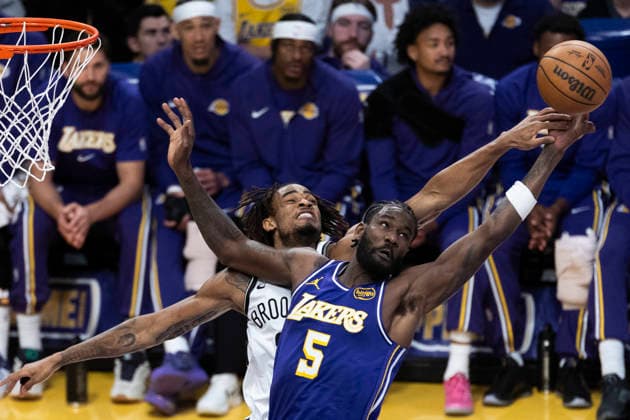 March 27, 2026, Los Angeles, California, USA: Los Angeles LakersÃ¢â‚¬â ¢ Deandre Ayton (5) and Brooklyn NetsÃ¢â‚¬â ¢ Nic Claxton (33) vie for a rebound during an NBA, Basketball Herren, USA basketball game at Crypto.com Arena on Friday, March 27, 2026 in Los Angeles. NBA 2026: Nets Vs Lakers  - ZUMAc68_ 20260327_zaf_c68_043 Copyright: xRingoxChiux