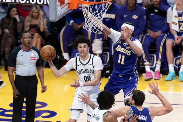 March 27, 2026, Los Angeles, California, USA: Brooklyn NetsÃ¢â‚¬â ¢ Nolan Traore (88) looks to pass while defended Los Angeles LakersÃ¢â‚¬â ¢ Jaxson Hayes (11) during an NBA, Basketball Herren, USA basketball game at Crypto.com Arena on Friday, March 27, 2026 in Los Angeles. NBA 2026: Lakers 116:99 Nets  - ZUMAc68_ 20260327_zaf_c68_072 Copyright: xRingoxChiux