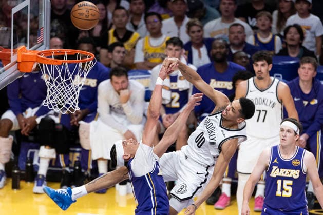 March 27, 2026, Los Angeles, California, United States: Brooklyn Nets™ Josh Minott (00) goes to the basket against Los Angeles Lakers™ Jaxson Hayes (11) during an NBA, Basketball Herren, USA basketball game at Crypto.com Arena on Friday, March 27, 2026 in Los Angeles. NBA 2026: Lakers 116:99 Nets - 27 Mar 2026  - ZUMAs197 20260327_aaa_s197_558 Copyright: xRingoxChiux