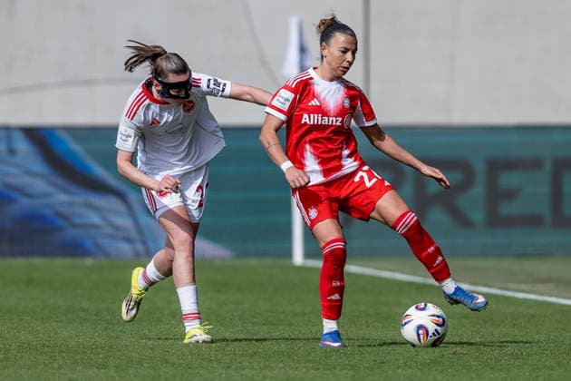 Kampf um den Ball Zweikampf zwischen Julia Pollak (1. FC Nuernberg, 22) und Arianna Caruso (FC Bayern Muenchen Frauen, 27) GER, FC Bayern Muenchen Frauen vs. 1. FC Nuernberg, Fussball, Google Pixel Frauen-Bundesliga, 22. Spieltag, Saison 2025 2026, 28.03.2026. (DFL DFB REGULATIONS PROHIBIT ANY USE OF PHOTOGRAPHS as IMAGE SEQUENCES and or QUASI-VIDEO). GER, FC Bayern Muenchen Frauen vs. 1. FC Nuernberg, Fussball, Google Pixel Frauen-Bundesliga, 22. Spieltag, Saison 2025 2026, 28.03.2026. Muenchen Copyright: xEibner-Pressefoto HeikexFeinerx EP_HFR