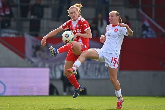Stine BALLISAGER (FCB), Aktion,Zweikampf gegen Emoeke PAPAI (N). Fussball Google Pixel Bundesliga der Frauen Saison 2025 2026, 22.Spieltag, Spieltag22 FC Bayern Muenchen Frauen - 1.FC Nuernberg am 28.03.2026 FC BAYERN CAMPUS