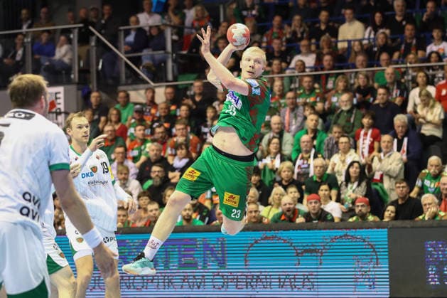 28.03.2026, xtgx, Handball, Daikin HBL, SC Magdeburg - Füchse Berlin v.l. Magnus Saugstrup (Magdeburg, 23) wirft Tor, Torschuetze, erzielt Tor, Treffer, scores the goal Magdeburg