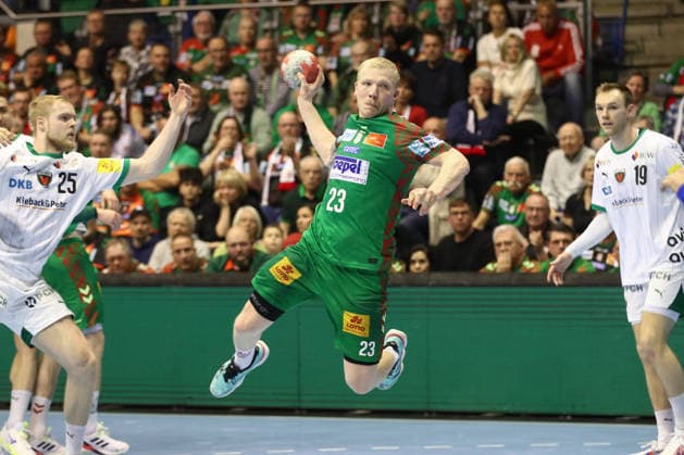 28.03.2026, xtgx, Handball, Daikin HBL, SC Magdeburg - Füchse Berlin v.l. Magnus Saugstrup (Magdeburg, 23) wirft Tor, Torschuetze, erzielt Tor, Treffer, scores the goal Magdeburg